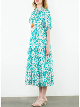 Load image into Gallery viewer, Tiered maxi dress in aqua and cream ikat print with tassel tie neckline and flutter sleeves - 6