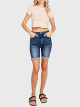 Load image into Gallery viewer, Woman wearing blue high rise bermuda denim shorts with rolled cuffs and a beige crop tee, casual summer style - 8