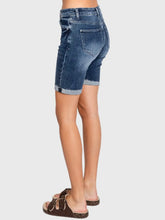 Load image into Gallery viewer, Woman wearing blue high rise bermuda denim shorts with rolled cuffs and a beige crop tee, casual summer style - 4