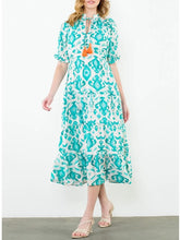 Load image into Gallery viewer, Tiered maxi dress in aqua and cream ikat print with tassel tie neckline and flutter sleeves - 7