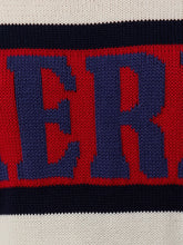 Load image into Gallery viewer, Oversized ivory knit America sweater with red and navy stripe graphic lettering, paired with denim mini skirt - 6