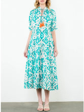 Load image into Gallery viewer, Tiered maxi dress in aqua and cream ikat print with tassel tie neckline and flutter sleeves - 2