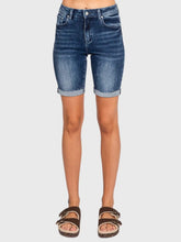 Load image into Gallery viewer, Woman wearing blue high rise bermuda denim shorts with rolled cuffs and a beige crop tee, casual summer style - 3