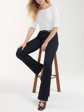 Load image into Gallery viewer, Bobbie Baby Boot Jean in Nocturnal Haze dark wash denim, high-rise flare fit, paired with white ribbed top - 1