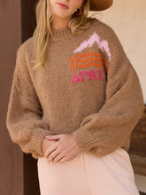 Load image into Gallery viewer, Camel chunky knit mock neck sweater with pink and orange mountain Apres Ski graphic design - 1