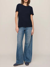 Load image into Gallery viewer, Woman wearing Foundation Slub Tee in Eclipse navy blue, classic crew neck short sleeve cotton t-shirt with jeans - 3