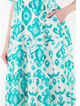 Load image into Gallery viewer, Tiered maxi dress in aqua and cream ikat print with tassel tie neckline and flutter sleeves - 4