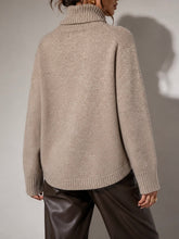 Load image into Gallery viewer, Oversized taupe textured turtleneck sweater with ribbed cuffs and hem, styled with dark brown leather pants - 2
