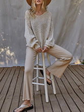 Load image into Gallery viewer, Woman wearing natural beige open knit boat neck sweater with wide brim hat and cream ribbed pants - 2
