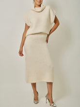 Load image into Gallery viewer, Ivory sequin sleeveless turtleneck sweater in soft knit fabric, paired with matching knit skirt - 6
