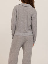 Load image into Gallery viewer, Woman wearing Slow Morning Polo in Heather Grey with matching joggers, styled in desert landscape - 6
