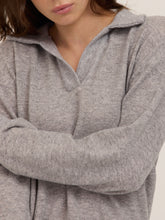 Load image into Gallery viewer, Woman wearing Slow Morning Polo in Heather Grey with matching joggers, styled in desert landscape - 3
