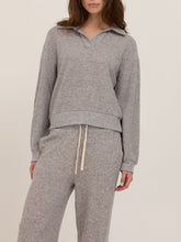 Load image into Gallery viewer, Woman wearing Slow Morning Polo in Heather Grey with matching joggers, styled in desert landscape - 4
