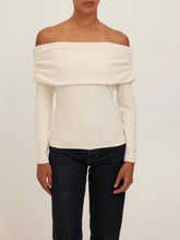 Load image into Gallery viewer, Studio City cream off-shoulder long sleeve top with folded neckline, paired with dark denim jeans, front view - 1
