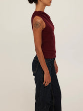 Load image into Gallery viewer, Laurel Tee in Dark Cherry, asymmetric one-shoulder draped burgundy top styled with dark wash jeans - 3
