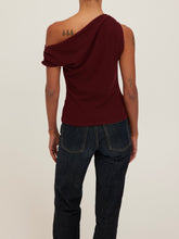 Load image into Gallery viewer, Laurel Tee in Dark Cherry, asymmetric one-shoulder draped burgundy top styled with dark wash jeans - 5
