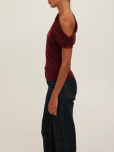 Load image into Gallery viewer, Laurel Tee in Dark Cherry, asymmetric one-shoulder draped burgundy top styled with dark wash jeans - 4
