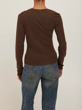 Load image into Gallery viewer, Harlow Long Sleeve Top in Dark Mocha with asymmetric neckline and ruched draping, styled with low-rise jeans - 4
