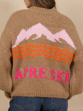 Load image into Gallery viewer, Camel chunky knit mock neck sweater with pink and orange mountain Apres Ski graphic design - 4
