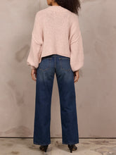 Load image into Gallery viewer, Oversized chunky knit mock neck sweater in light pink paired with wide-leg blue jeans - 5
