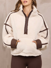 Load image into Gallery viewer, Beige sherpa quarter-zip pullover with brown binding trim details and kangaroo pocket - 1
