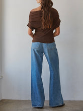 Load image into Gallery viewer, Brown off-shoulder pleated short sleeve top paired with blue jeans, women's boutique fashion - 3
