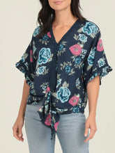Load image into Gallery viewer, Navy floral kimono sleeve top with blue and pink roses, V-neck, tie front, and ruffle sleeves paired with jeans - 1
