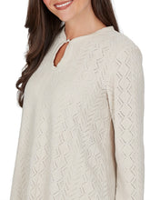 Load image into Gallery viewer, Oatmeal chevron knit long sleeve top with keyhole neckline and layered lace hem cami, paired with dark jeans - 6
