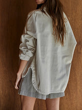 Load image into Gallery viewer, Oversized oyster twill jacket worn open over white bralette and striped drawstring pants, relaxed casual style - 3
