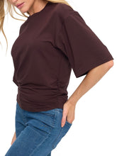 Load image into Gallery viewer, Woman wearing oversized brown ruched waist short sleeve tee paired with blue skinny jeans - 3

