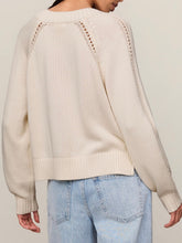 Load image into Gallery viewer, Stratton V-neck cream knit sweater with raglan detail and ribbed hem paired with light wash jeans - 3
