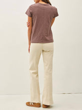 Load image into Gallery viewer, Woman wearing a relaxed fit cotton slub tee in cocoa brown with crew neck and short sleeves paired with cream pants - 4
