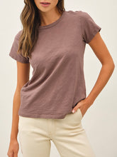 Load image into Gallery viewer, Woman wearing a relaxed fit cotton slub tee in cocoa brown with crew neck and short sleeves paired with cream pants - 1
