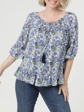 Load image into Gallery viewer, Floral Bell Sleeve Top in Blue Multi with tassel neckline and ruffle hem, paired with blue jeans - 1
