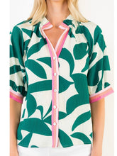 Load image into Gallery viewer, Silky Geo Top in green and white tropical leaf print with pink contrast trim, button-front, 3/4 sleeves - 4
