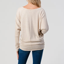 Load image into Gallery viewer, Women's oatmeal brushed dolman top with batwing sleeves and banded hem, paired with blue skinny jeans - 4
