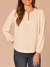 Load image into Gallery viewer, Heather cream mix media notch neck top with lace yoke, ribbed front, and balloon sleeves paired with dark jeans - 1
