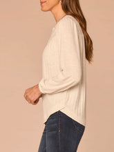Load image into Gallery viewer, Heather cream mix media notch neck top with lace yoke, ribbed front, and balloon sleeves paired with dark jeans - 4
