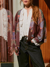 Load image into Gallery viewer, Crane Plum kimono jacket with paisley print layered over white lace blouse and dark jeans, boho style - 1
