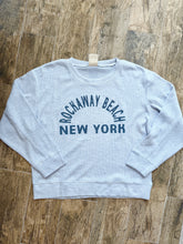 Load image into Gallery viewer, Light blue thermal crew sweatshirt with Rockaway Beach New York graphic print, laid flat on wood floor - 2
