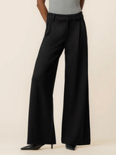 Load image into Gallery viewer, Cheryl super high rise wide leg black trousers with pleated front detail, styled with black heels - 1
