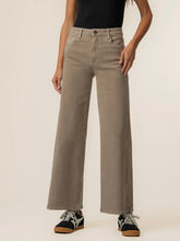 Load image into Gallery viewer, Meg High Rise Wide Leg Jean in Milk Tea tan denim, paired with black sneakers on female model - 1
