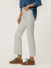 Load image into Gallery viewer, Kelsey high rise ankle flare jeans in ecru paired with blue denim shirt and brown sneakers with green laces - 2
