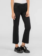 Load image into Gallery viewer, Kelsey high rise ankle flare jeans in black with raw hem, styled with patent leather lace-up oxford shoes - 1
