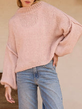 Load image into Gallery viewer, Oversized chunky knit mock neck sweater in light pink paired with wide-leg blue jeans - 1
