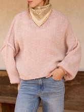 Load image into Gallery viewer, Oversized chunky knit mock neck sweater in light pink paired with wide-leg blue jeans - 3

