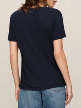 Load image into Gallery viewer, Woman wearing Foundation Slub Tee in Eclipse navy blue, classic crew neck short sleeve cotton t-shirt with jeans - 2
