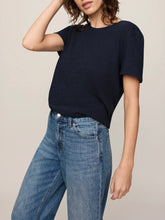 Load image into Gallery viewer, Woman wearing Foundation Slub Tee in Eclipse navy blue, classic crew neck short sleeve cotton t-shirt with jeans - 4
