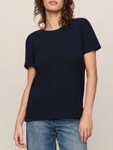 Load image into Gallery viewer, Woman wearing Foundation Slub Tee in Eclipse navy blue, classic crew neck short sleeve cotton t-shirt with jeans - 1
