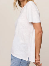 Load image into Gallery viewer, Woman wearing white Foundation Slub Tee with blue high-waist jeans, styled with gold bracelet and rings - 5
